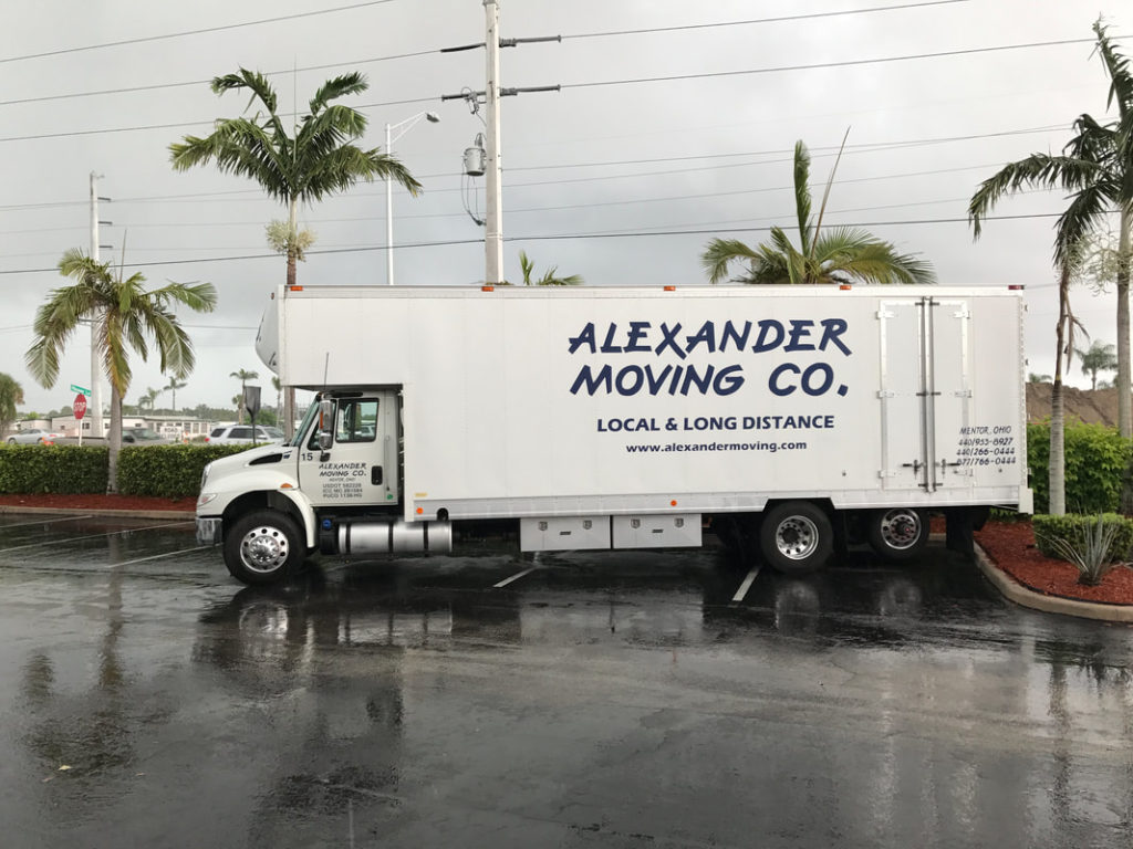 Alexander Moving truck parked in a tropical location for Packing Services Mentor OH